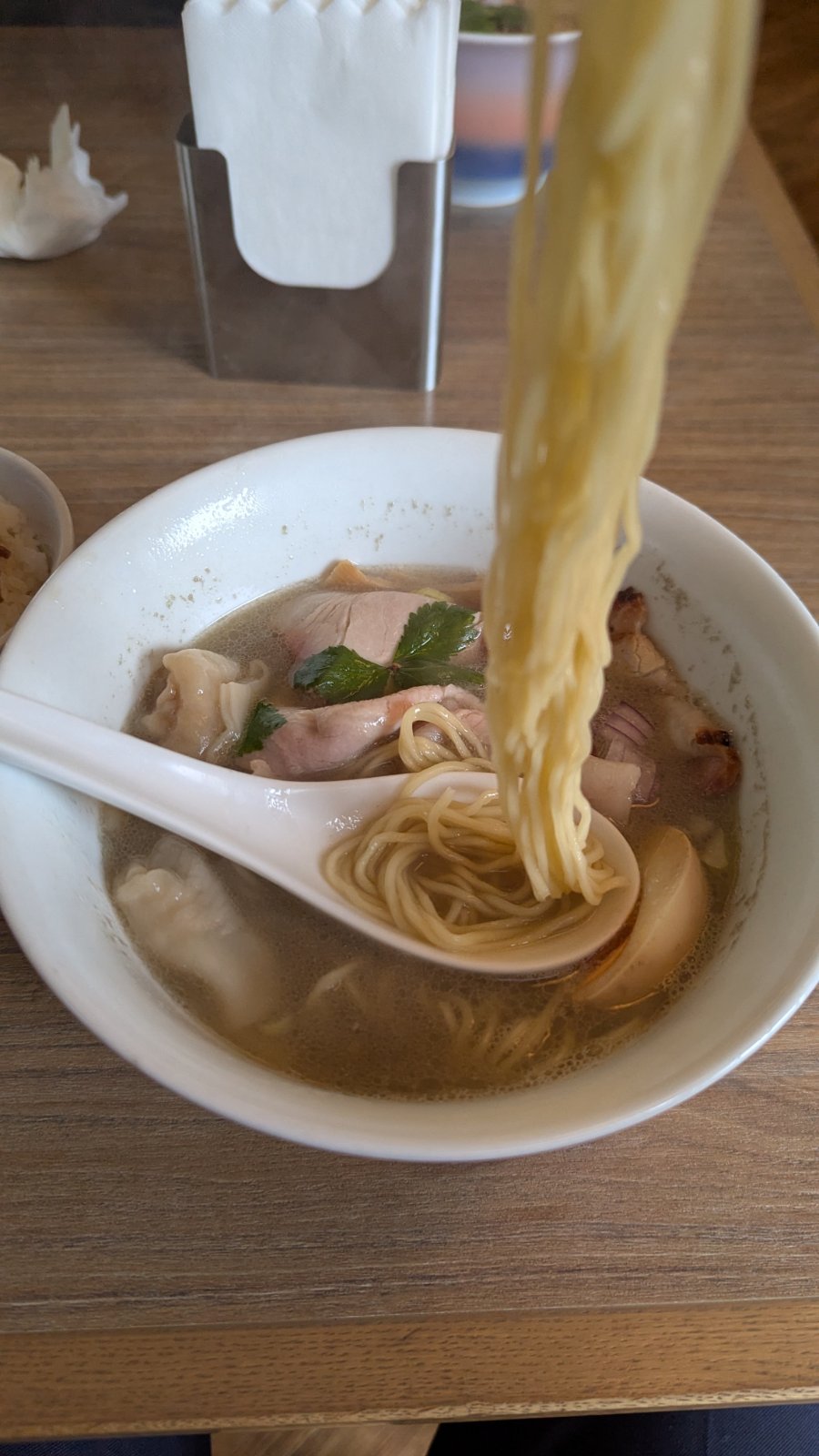 Thin noodles lifted from ramen broth at Chukasoba Waka